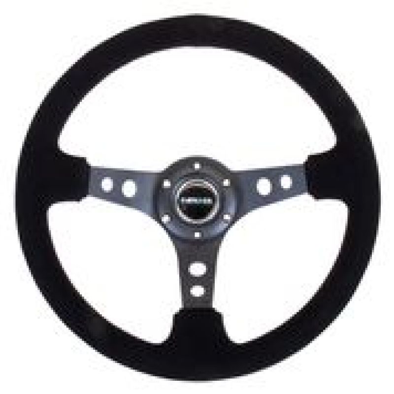 NRG Reinforced Steering Wheel (350mm / 3in. Deep) Blk Suede/Blk Stitch w/Black Circle Cutout Spokes NRG Reinforced Steering Wheel (350mm / 3in. Deep) Blk Suede/Blk Stitch w/Black Circle Cutout Spokes