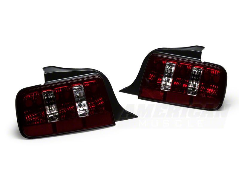 Raxiom 05-09 Ford Mustang Coyote Tail Lights- Blk Housing (Smoked Lens) Raxiom 05-09 Ford Mustang Coyote Tail Lights- Blk Housing (Smoked Lens)