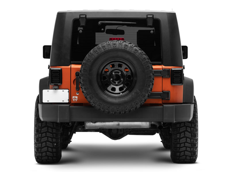 Raxiom 07-18 Jeep Wrangler JK LED Tail Lights- Black Housing (Smoked Lens) Raxiom 07-18 Jeep Wrangler JK LED Tail Lights- Black Housing (Smoked Lens)