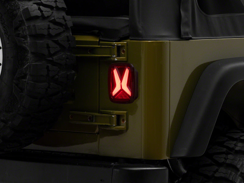 Raxiom 76-06 Jeep CJ7 Wrangler YJ & TJ Gladiator LED Tail Lights- Blk Housing (Smoked Lens) Raxiom 76-06 Jeep CJ7 Wrangler YJ & TJ Gladiator LED Tail Lights- Blk Housing (Smoked Lens)