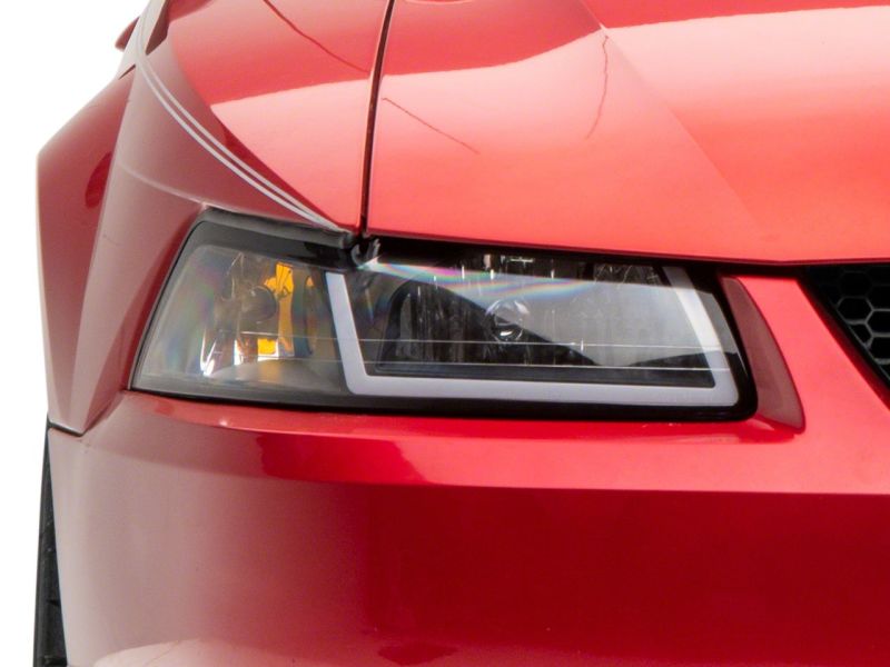 Raxiom 99-04 Ford Mustang Axial Series Headlights w/ Sequential LED Bar- Blk Housing (Clear Lens) Raxiom 99-04 Ford Mustang Axial Series Headlights w/ Sequential LED Bar- Blk Housing (Clear Lens)