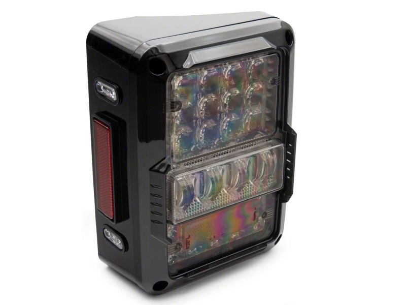 Raxiom 07-18 Jeep Wrangler JK Axial Series Lux LED Tail Lights- Blk Housing (Clear Lens) Raxiom 07-18 Jeep Wrangler JK Axial Series Lux LED Tail Lights- Blk Housing (Clear Lens)