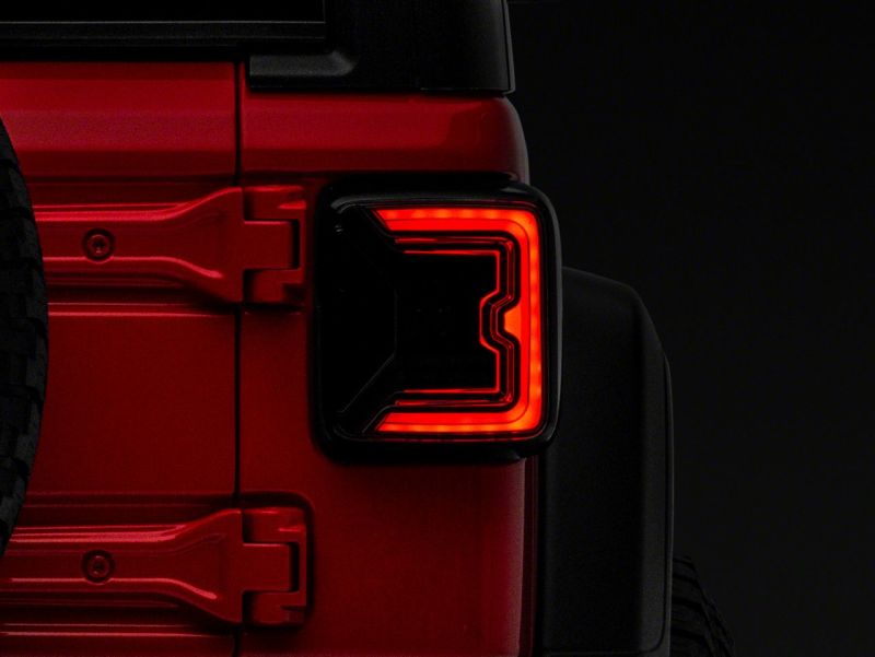 Raxiom 18-23 Jeep Wrangler JL Axial Series LED Tail Lights- Blk Housing (Smoked Lens) Raxiom 18-23 Jeep Wrangler JL Axial Series LED Tail Lights- Blk Housing (Smoked Lens)