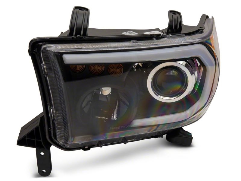 Raxiom 07-13 Toyota Tundra Axial Series Projector Headlights w/ LED Bar- Blk Housing (Clear Lens) Raxiom 07-13 Toyota Tundra Axial Series Projector Headlights w/ LED Bar- Blk Housing (Clear Lens)