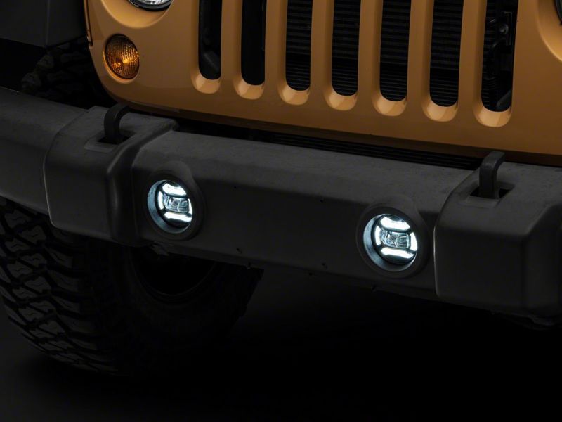 Raxiom 07-18 Jeep Wrangler JK Axial Series 4-In LED Fog Lights- Clear Raxiom 07-18 Jeep Wrangler JK Axial Series 4-In LED Fog Lights- Clear