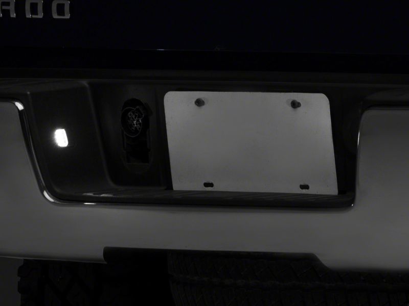 Raxiom 14-18 Chevrolet Silverado 1500 Axial Series LED License Plate Lamps Raxiom 14-18 Chevrolet Silverado 1500 Axial Series LED License Plate Lamps