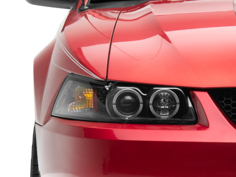 Raxiom 99-04 Ford Mustang Dual LED Halo Projector Headlights- Black Housing (Clear Lens) Raxiom 99-04 Ford Mustang Dual LED Halo Projector Headlights- Black Housing (Clear Lens)