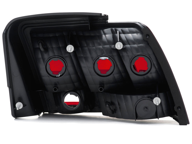 Raxiom 99-04 Ford Mustang Excluding 99-01 Cobra Tail Lights- Black Housing (Smoked Lens) Raxiom 99-04 Ford Mustang Excluding 99-01 Cobra Tail Lights- Black Housing (Smoked Lens)