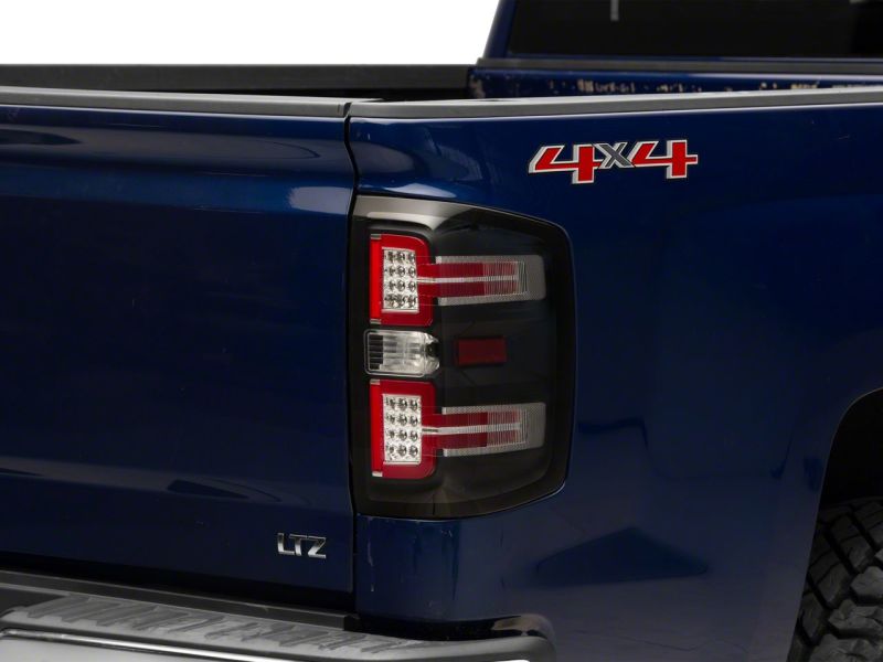 Raxiom 14-18 Chevrolet Silverado 1500 LED Taillights w/ SEQL Turn Signals- Blk Housing (Clear Lens) Raxiom 14-18 Chevrolet Silverado 1500 LED Taillights w/ SEQL Turn Signals- Blk Housing (Clear Lens)