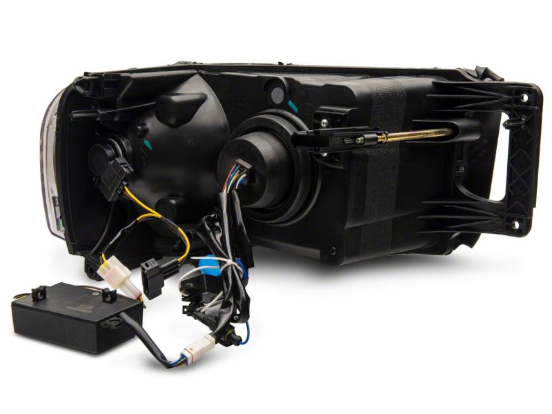 Raxiom 02-05 Dodge RAM 1500 LED Projector Headlights w/ SEQL LED Bar- Blk Housing (Clear Lens) Raxiom 02-05 Dodge RAM 1500 LED Projector Headlights w/ SEQL LED Bar- Blk Housing (Clear Lens)