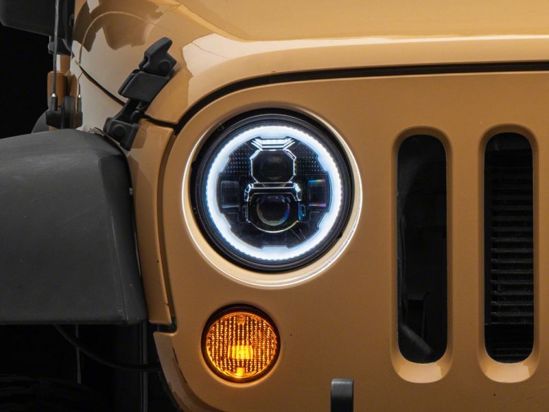 Raxiom 07-18 Jeep Wrangler JK Axial 7-In LED Headlights w/ DRL Turn Signals- Blk Housing (Clear) Raxiom 07-18 Jeep Wrangler JK Axial 7-In LED Headlights w/ DRL Turn Signals- Blk Housing (Clear)