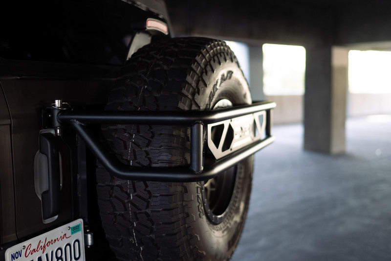 DV8 Offroad 21-23 Ford Bronco Spare Tire Guard & Accessory Mount DV8 Offroad 21-23 Ford Bronco Spare Tire Guard & Accessory Mount