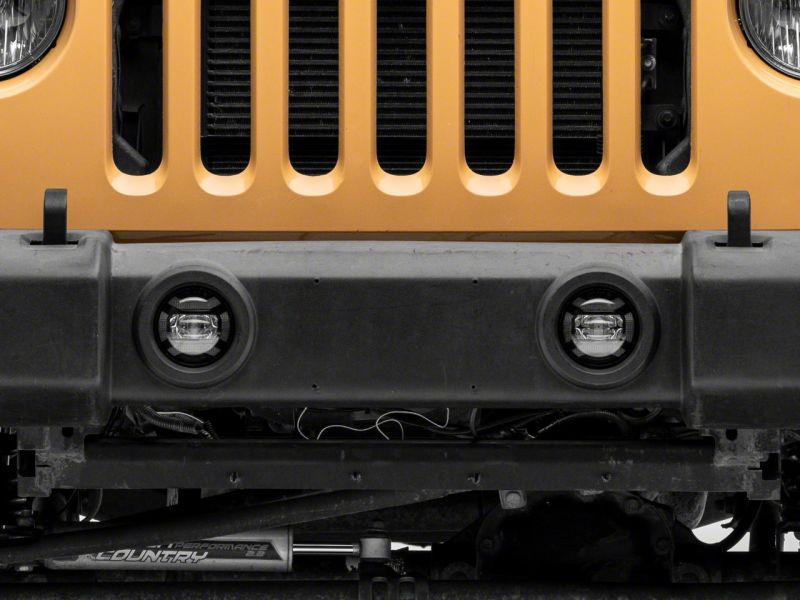 Raxiom 07-18 Jeep Wrangler JK Axial Series 4-In LED Fog Lights- Clear Raxiom 07-18 Jeep Wrangler JK Axial Series 4-In LED Fog Lights- Clear