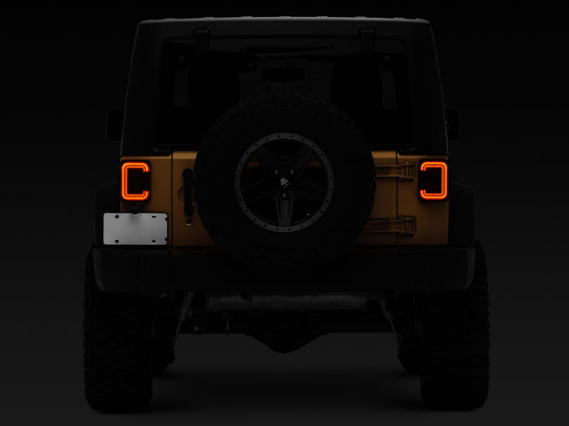Raxiom 07-18 Jeep Wrangler JK Axial Series LED Halo Tail Lights- Black Housing (Dark Smoked Lens) Raxiom 07-18 Jeep Wrangler JK Axial Series LED Halo Tail Lights- Black Housing (Dark Smoked Lens)