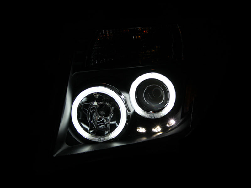 ANZO 2005-2008 Nissan Frontier Projector Headlights w/ Halo Black ANZO 2005-2008 Nissan Frontier Projector Headlights w/ Halo Black