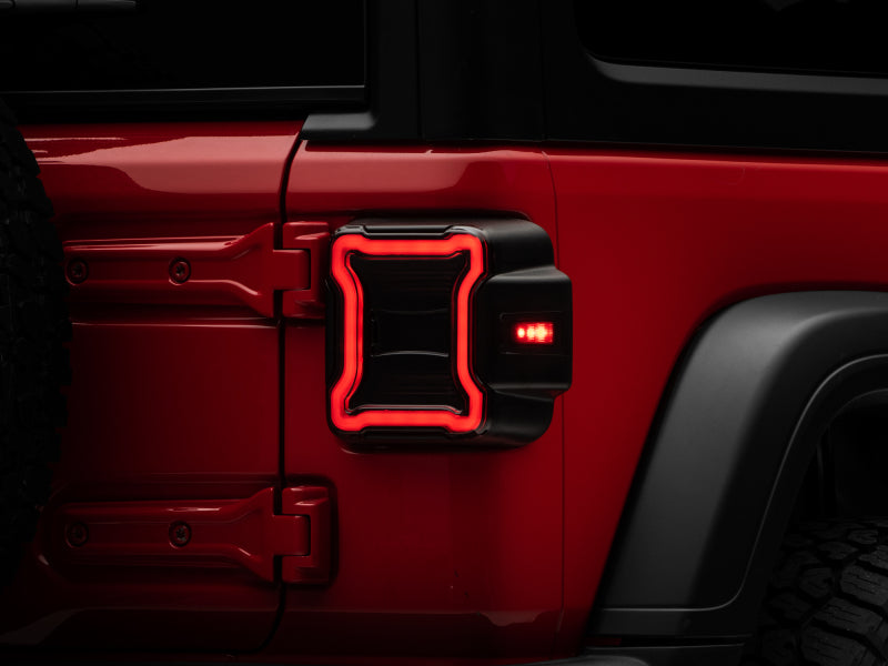 Raxiom 18-22 Jeep Wrangler JL LED Tail Lights- Black Housing (Smoked Lens) Raxiom 18-22 Jeep Wrangler JL LED Tail Lights- Black Housing (Smoked Lens)