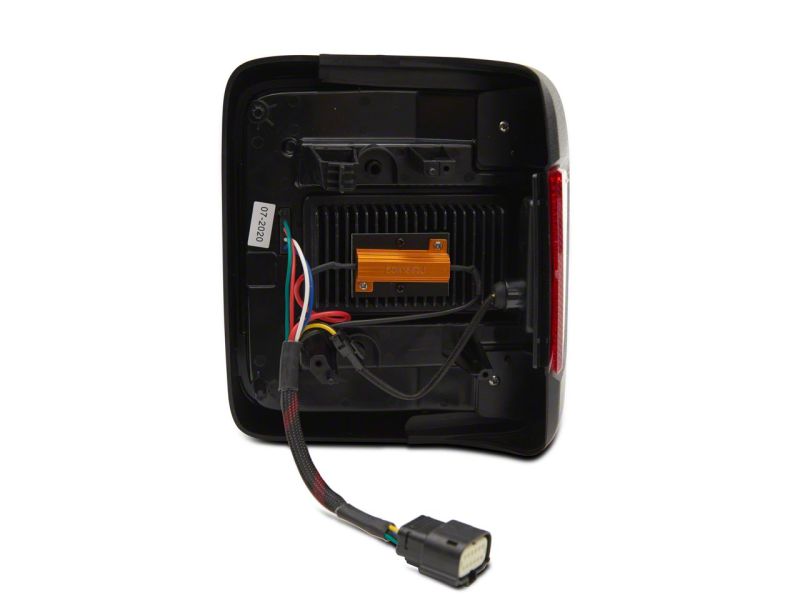 Raxiom 18-23 Jeep Wrangler JL LED Tail Lights- Blk Housing (Smoked Lens) Raxiom 18-23 Jeep Wrangler JL LED Tail Lights- Blk Housing (Smoked Lens)