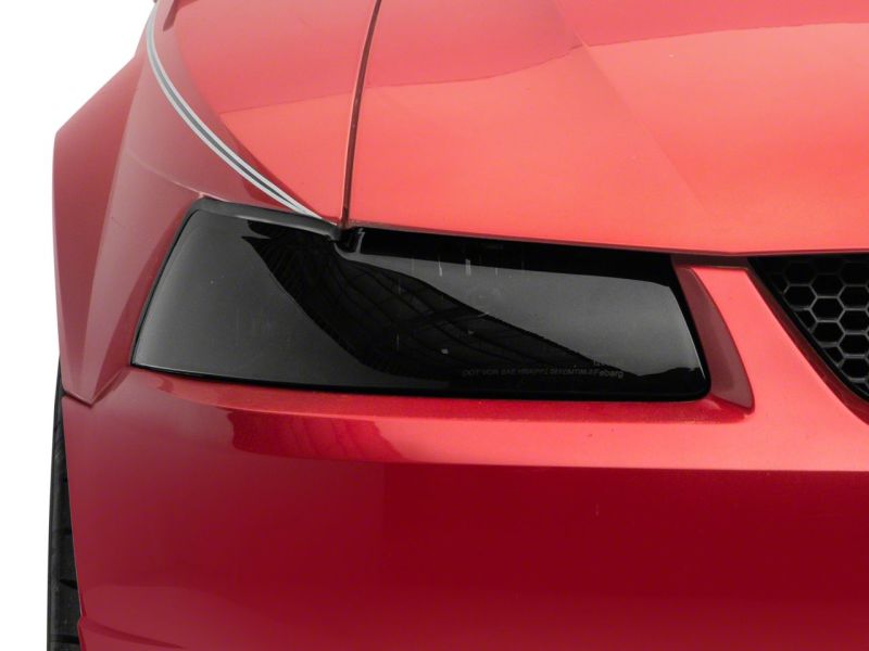 Raxiom 99-04 Ford Mustang Axial Series OEM Style Replacement Headlights- Blk Housing (Smoked Lens) Raxiom 99-04 Ford Mustang Axial Series OEM Style Replacement Headlights- Blk Housing (Smoked Lens)