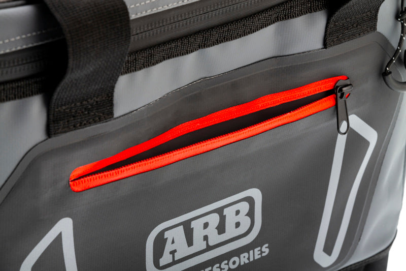 ARB Cooler Bag Charcoal w/ Red Highlights 15in L x 11in W x 9in H Holds 22 Cans ARB Cooler Bag Charcoal w/ Red Highlights 15in L x 11in W x 9in H Holds 22 Cans