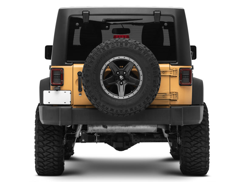 Raxiom 07-18 Jeep Wrangler JK Axial Series LED Halo Tail Lights- Black Housing (Dark Smoked Lens) Raxiom 07-18 Jeep Wrangler JK Axial Series LED Halo Tail Lights- Black Housing (Dark Smoked Lens)