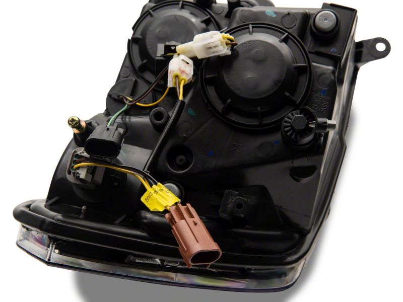 Raxiom 09-18 Dodge RAM 1500/2500/3500 Axial Headlights w/ SEQL LED Bar- Blk Housing (Clear Lens) Raxiom 09-18 Dodge RAM 1500/2500/3500 Axial Headlights w/ SEQL LED Bar- Blk Housing (Clear Lens)