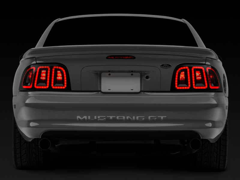 Raxiom 96-98 Ford Mustang Icon LED Tail Lights- Black Housing (Smoked Lens) Raxiom 96-98 Ford Mustang Icon LED Tail Lights- Black Housing (Smoked Lens)