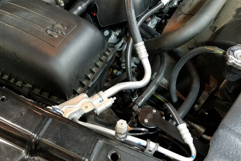 J&L 09-18 Ram 1500 5.7L Passenger Side Oil Separator 3.0 - Black Anodized J&L 09-18 Ram 1500 5.7L Passenger Side Oil Separator 3.0 - Black Anodized