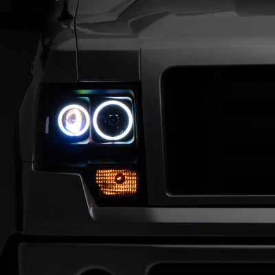 Raxiom 09-14 Ford F-150 Super White LED Halo Projector Headlights- Blk Housing (Clear Lens)