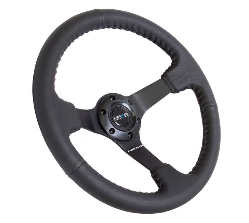 NRG Reinforced Steering Wheel (350mm / 3in. Deep) Bk Leather w/Bk BBall Stitch (Odi Bakchis Edition) NRG Reinforced Steering Wheel (350mm / 3in. Deep) Bk Leather w/Bk BBall Stitch (Odi Bakchis Edition)
