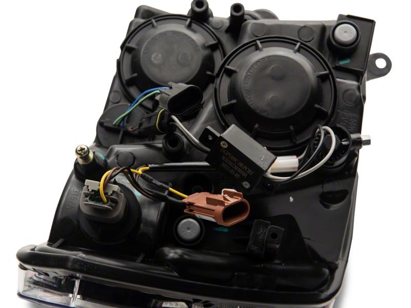 Raxiom 09-18 Dodge RAM 1500/2500/3500 Axial Series Headlights w/ LED Bar- Blk Housing (Clear Lens) Raxiom 09-18 Dodge RAM 1500/2500/3500 Axial Series Headlights w/ LED Bar- Blk Housing (Clear Lens)