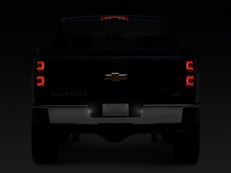 Raxiom 14-18 Chevrolet Silverado 1500 Axial Series LED License Plate Lamps Raxiom 14-18 Chevrolet Silverado 1500 Axial Series LED License Plate Lamps