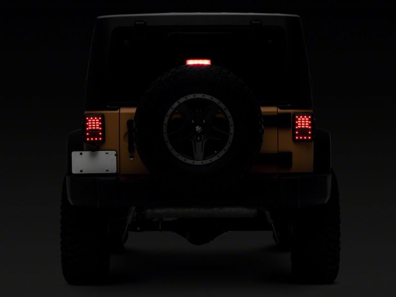 Raxiom 07-18 Jeep Wrangler JK Axial Series LED Tail Lights- Blk Housing (Clear Lens) Raxiom 07-18 Jeep Wrangler JK Axial Series LED Tail Lights- Blk Housing (Clear Lens)