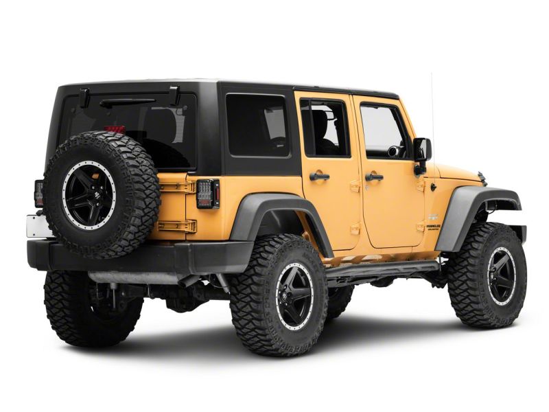 Raxiom 07-18 Jeep Wrangler JK Axial Series Lux LED Tail Lights- Blk Housing (Clear Lens) Raxiom 07-18 Jeep Wrangler JK Axial Series Lux LED Tail Lights- Blk Housing (Clear Lens)