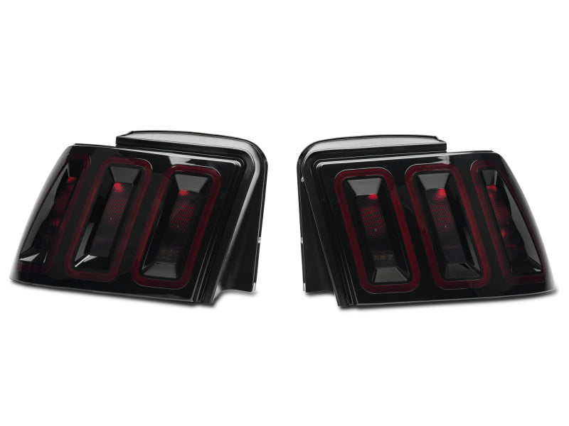 Raxiom 99-04 Ford Mustang Excluding 99-01 Cobra Icon LED Tail Lights- Black Housing (Smoked Lens) Raxiom 99-04 Ford Mustang Excluding 99-01 Cobra Icon LED Tail Lights- Black Housing (Smoked Lens)