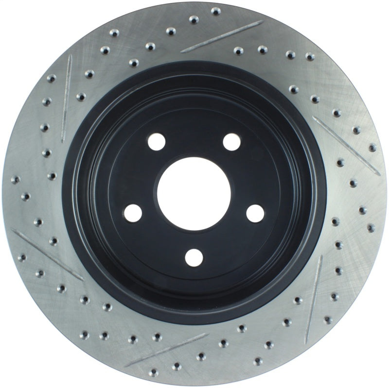 StopTech 12-15 Jeep Cherokee SRT8 Sport Slotted & Drilled Rear Driver Side Brake Rotor StopTech 12-15 Jeep Cherokee SRT8 Sport Slotted & Drilled Rear Driver Side Brake Rotor