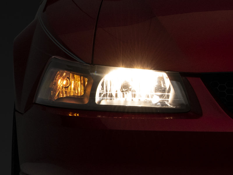 Raxiom 99-04 Mustang Axial Series OEM Style Replacement Headlights- Black Housing (Clear Lens) Raxiom 99-04 Mustang Axial Series OEM Style Replacement Headlights- Black Housing (Clear Lens)