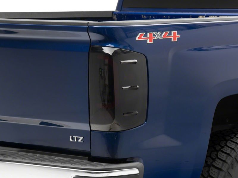 Raxiom 14-18 Chevrolet Silverado 1500 Axial Series LED Tail Lights- Blk Housing (Smoked Lens) Raxiom 14-18 Chevrolet Silverado 1500 Axial Series LED Tail Lights- Blk Housing (Smoked Lens)