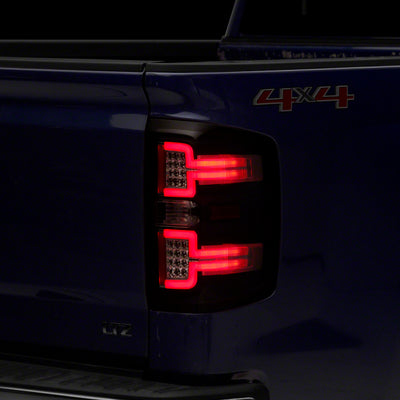 Raxiom 14-18 Chevrolet Silverado 1500 LED Taillights w/ SEQL Turn Signals- Blk Housing (Clear Lens)