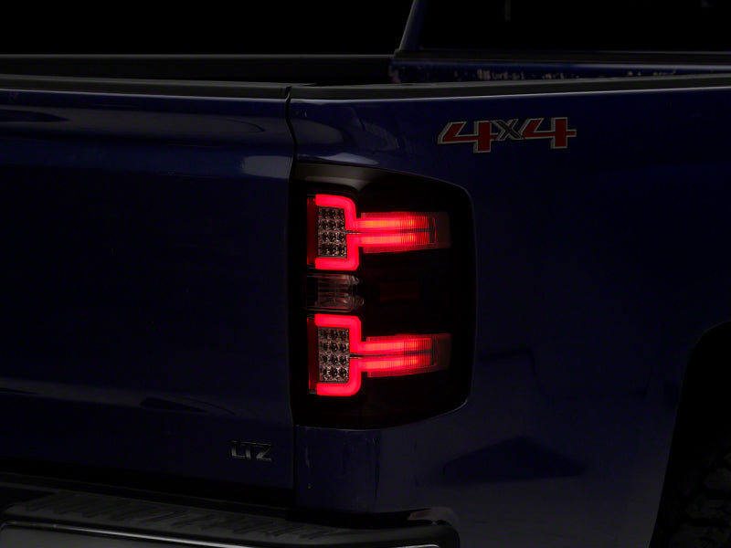 Raxiom 14-18 Chevrolet Silverado 1500 LED Taillights w/ SEQL Turn Signals- Blk Housing (Clear Lens) Raxiom 14-18 Chevrolet Silverado 1500 LED Taillights w/ SEQL Turn Signals- Blk Housing (Clear Lens)