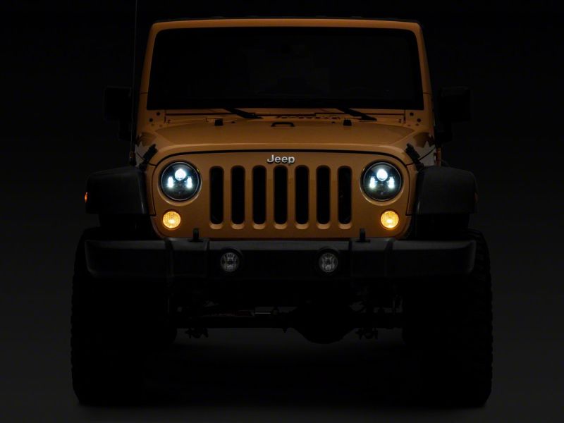 Raxiom 07-18 Jeep Wrangler JK 7-In LED Headlights- Blk Housing (Clear Lens) Raxiom 07-18 Jeep Wrangler JK 7-In LED Headlights- Blk Housing (Clear Lens)