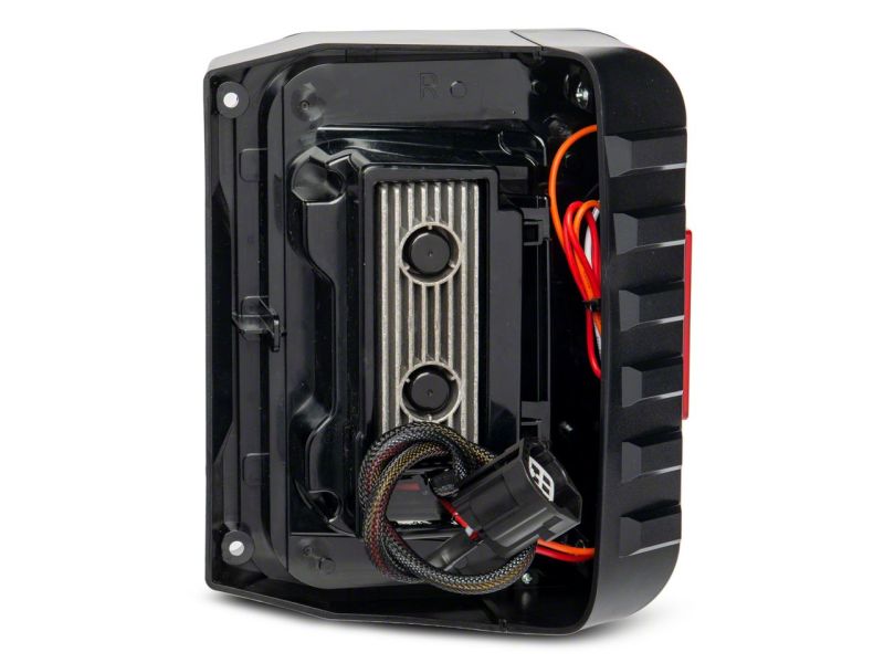 Raxiom 07-18 Jeep Wrangler JK Axial Series Trident LED Tail Lights- Blk Housing (Smoked Lens) Raxiom 07-18 Jeep Wrangler JK Axial Series Trident LED Tail Lights- Blk Housing (Smoked Lens)