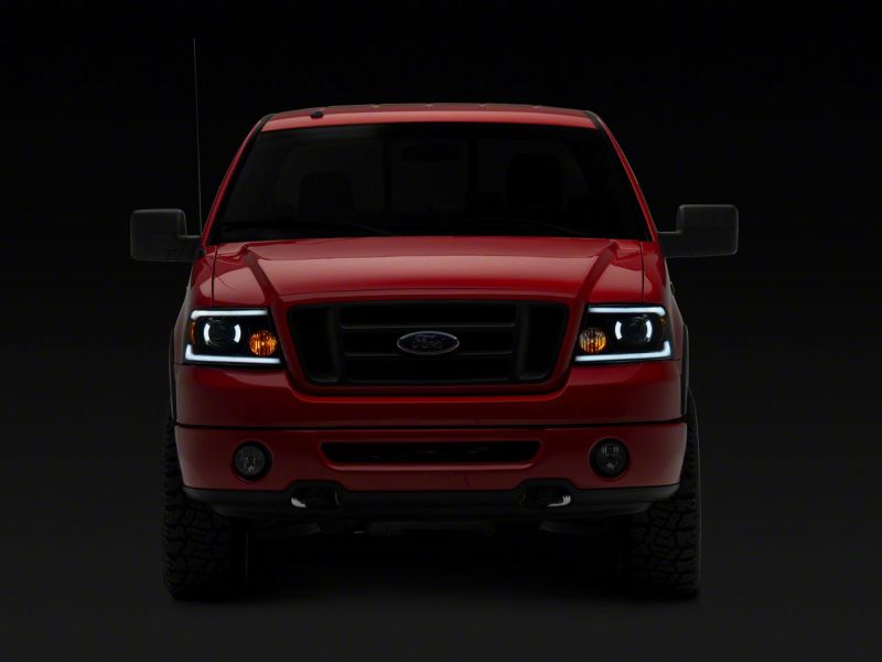 Raxiom 04-08 Ford F-150 Axial Series Projector Headlights w/ SEQL LED Bar- Blk Housing (Clear Lens) Raxiom 04-08 Ford F-150 Axial Series Projector Headlights w/ SEQL LED Bar- Blk Housing (Clear Lens)