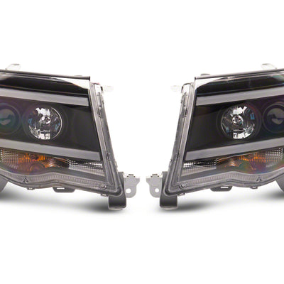 Raxiom 05-11 Toyota Tacoma Axial Series LED DRL Projector Headlights- Blk Housing (Clear Lens)