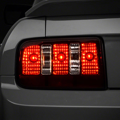 Raxiom 05-09 Ford Mustang Coyote Tail Lights- Blk Housing (Smoked Lens)