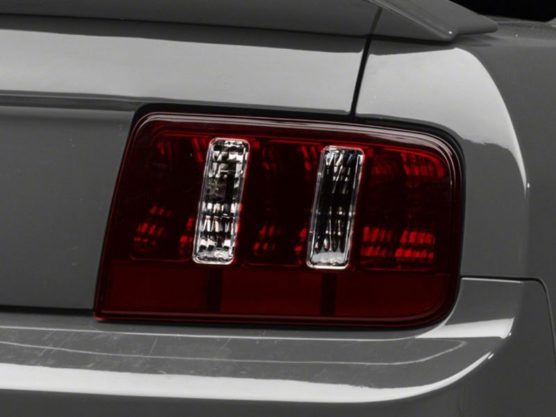 Raxiom 05-09 Ford Mustang Coyote Tail Lights- Blk Housing (Smoked Lens) Raxiom 05-09 Ford Mustang Coyote Tail Lights- Blk Housing (Smoked Lens)