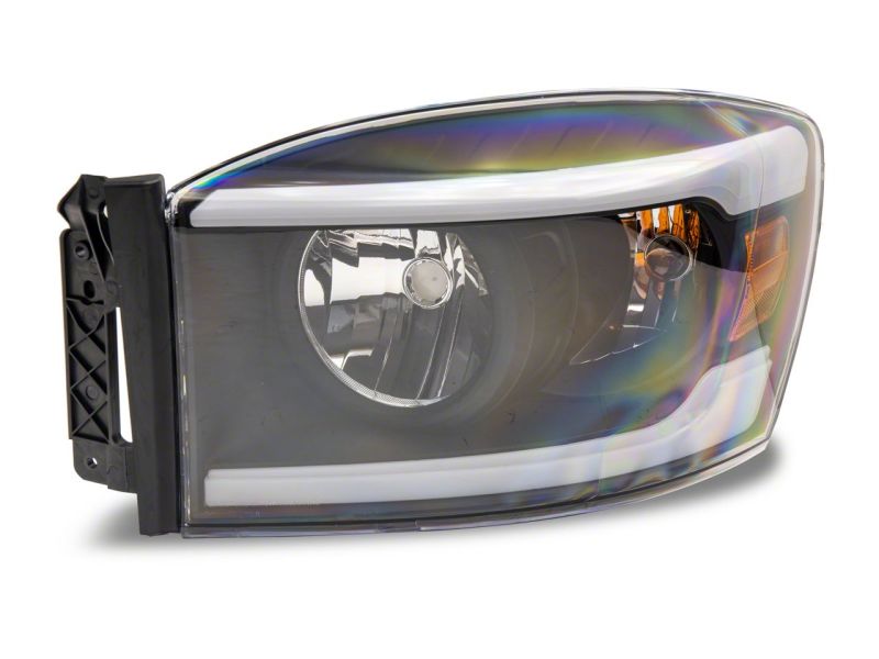 Raxiom 06-09 Dodge RAM 1500/2500/3500 Axial Headlights w/ SEQL LED Bar- Blk Housing (Clear Lens) Raxiom 06-09 Dodge RAM 1500/2500/3500 Axial Headlights w/ SEQL LED Bar- Blk Housing (Clear Lens)