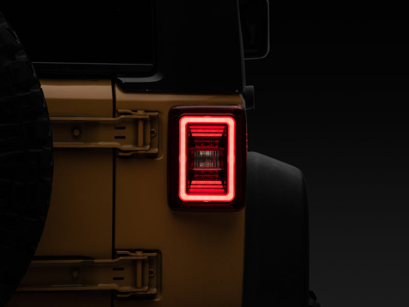 Raxiom 07-18 Jeep Wrangler JK JL Style LED Tail Lights- Black Housing - Red Lens Raxiom 07-18 Jeep Wrangler JK JL Style LED Tail Lights- Black Housing - Red Lens