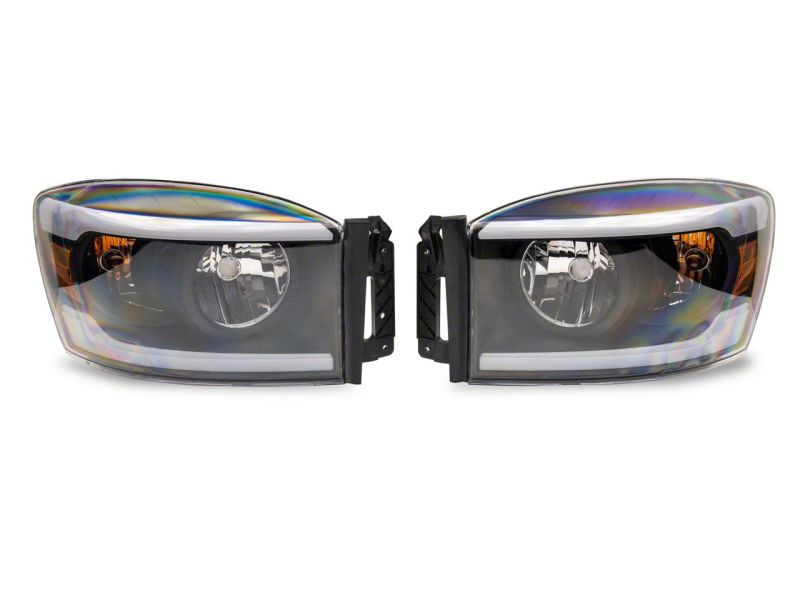 Raxiom 06-09 Dodge RAM 1500/2500/3500 Axial Headlights w/ SEQL LED Bar- Blk Housing (Clear Lens) Raxiom 06-09 Dodge RAM 1500/2500/3500 Axial Headlights w/ SEQL LED Bar- Blk Housing (Clear Lens)