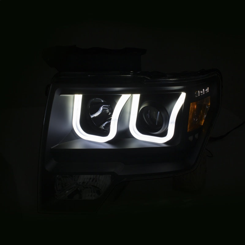 ANZO 2009-2014 Ford F-150 Projector Headlights w/ U-Bar Switchback Black w/ Amber ANZO 2009-2014 Ford F-150 Projector Headlights w/ U-Bar Switchback Black w/ Amber