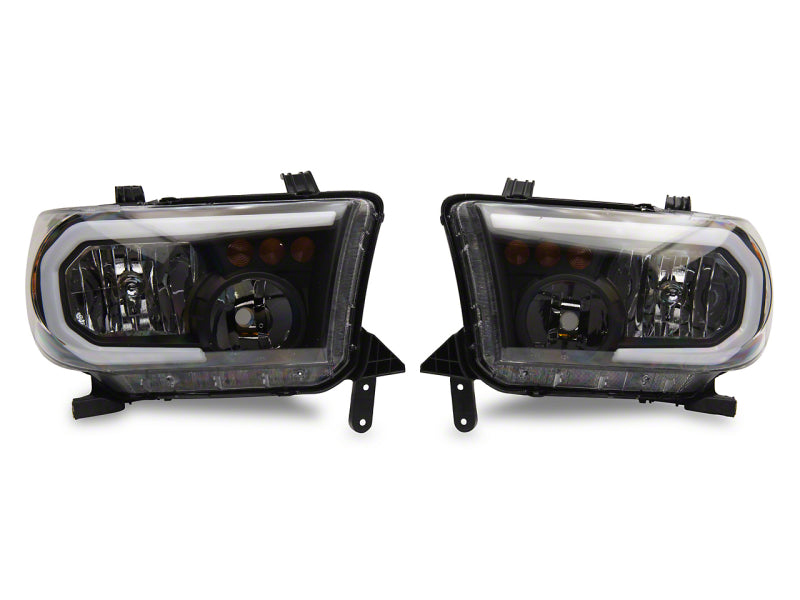 Raxiom 07-13 Toyota Tundra Axial Series Headlights w/ SEQL LED Bar- Blk Housing (Clear Lens) Raxiom 07-13 Toyota Tundra Axial Series Headlights w/ SEQL LED Bar- Blk Housing (Clear Lens)